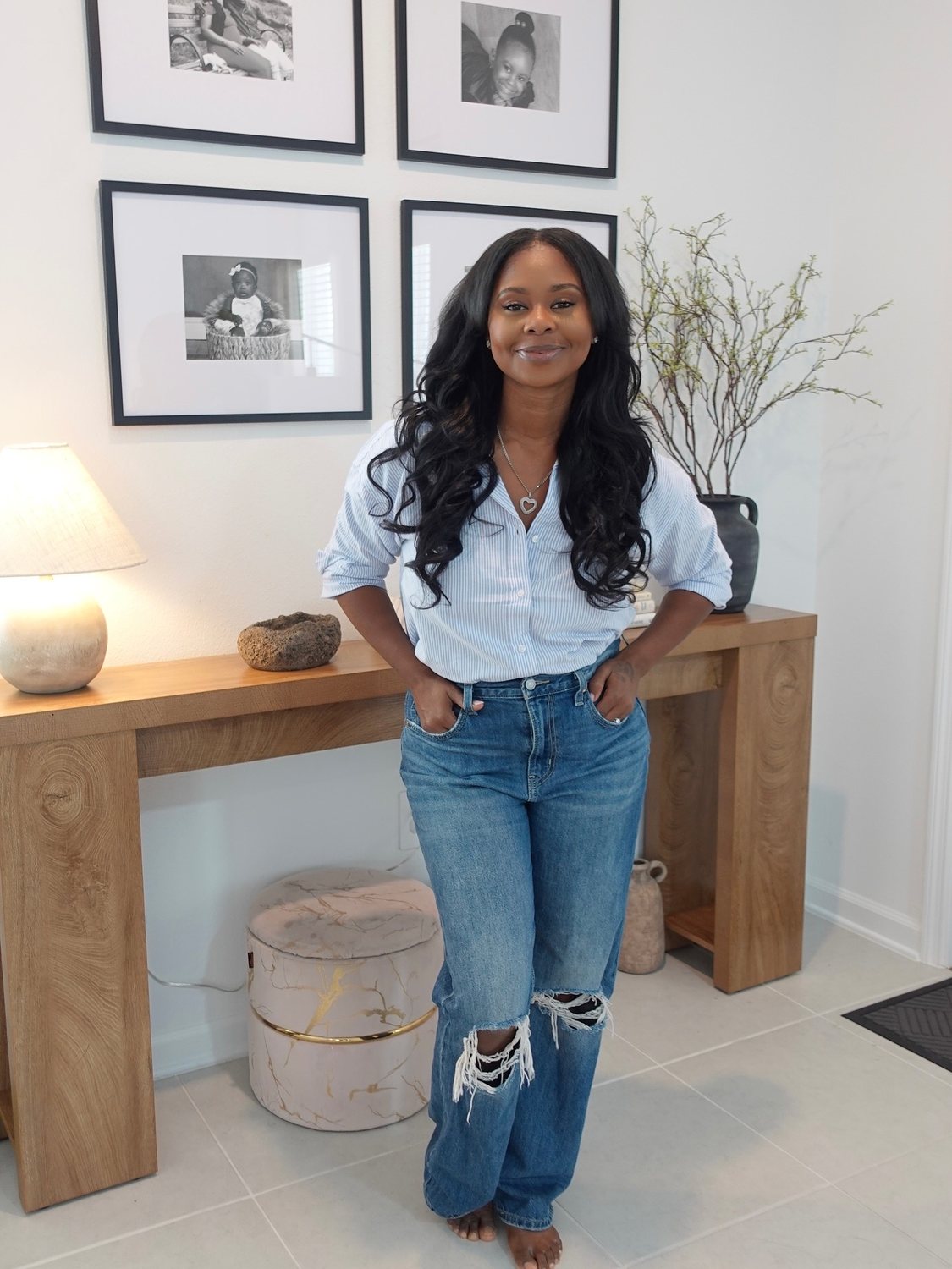 Kim Alexander at home with her family photos