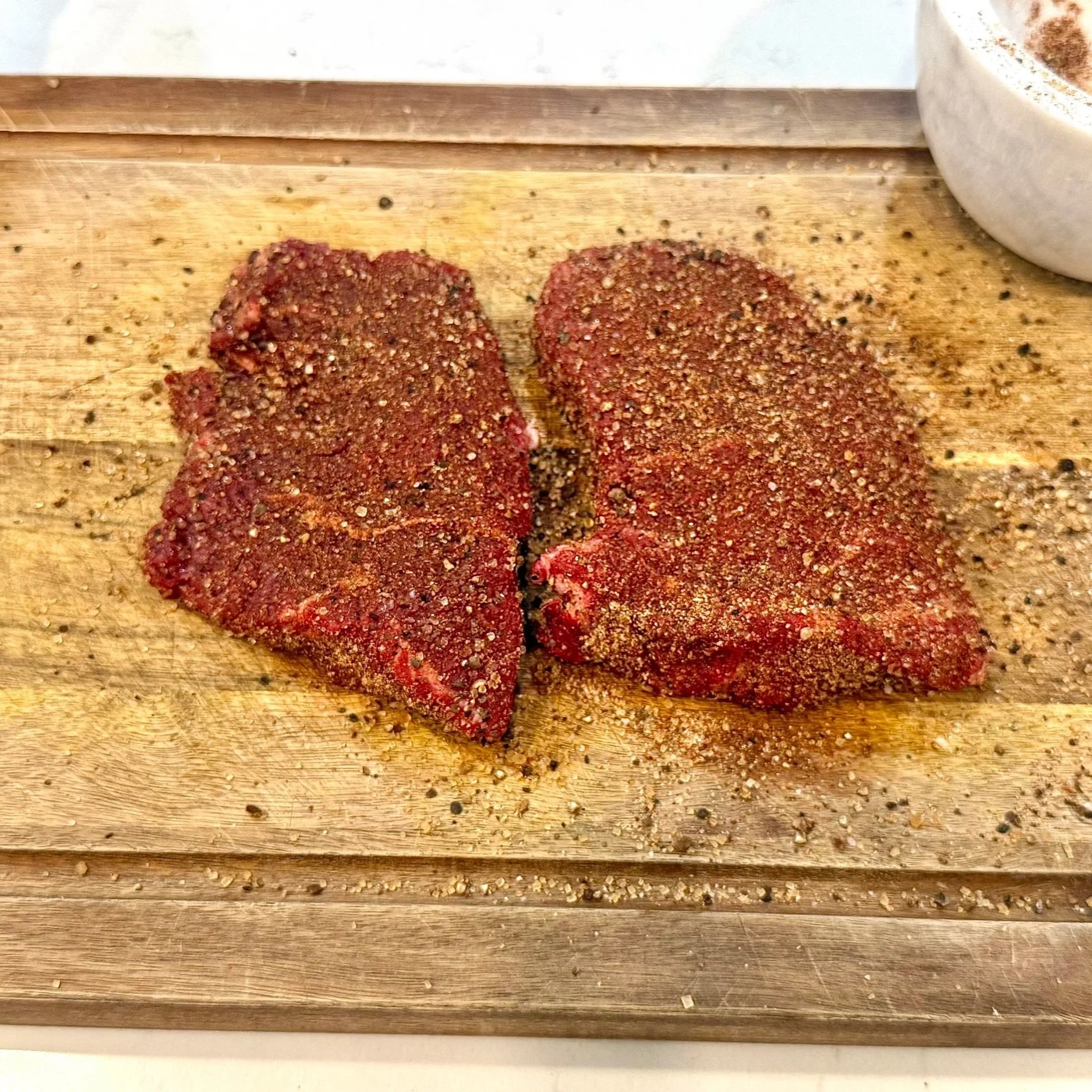 Press the pimento crust firmly onto all sides of the steak for maximum flavor. 