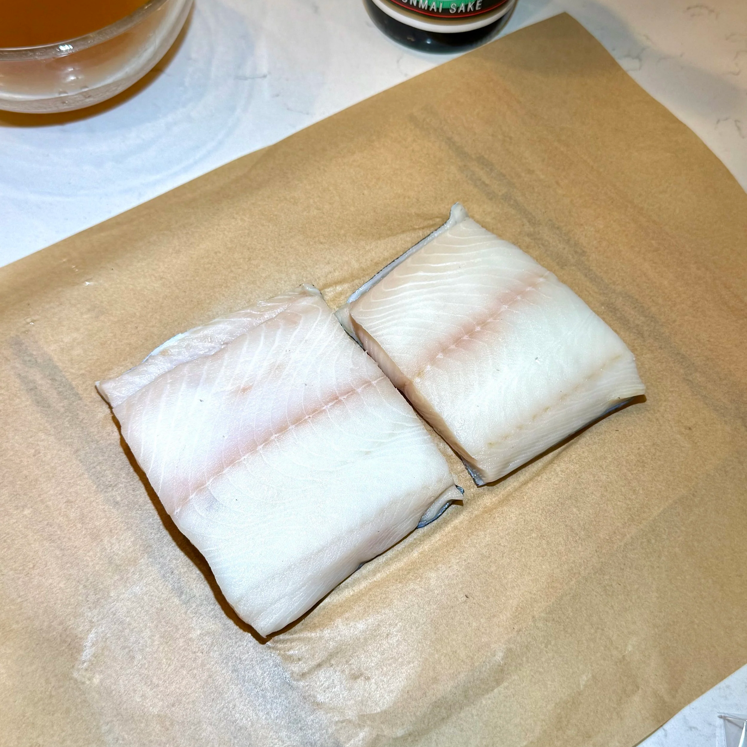  Fresh wild Alaska sablefish fillets, straight from the Sitka Seafood Market box, ready to be marinated. 
