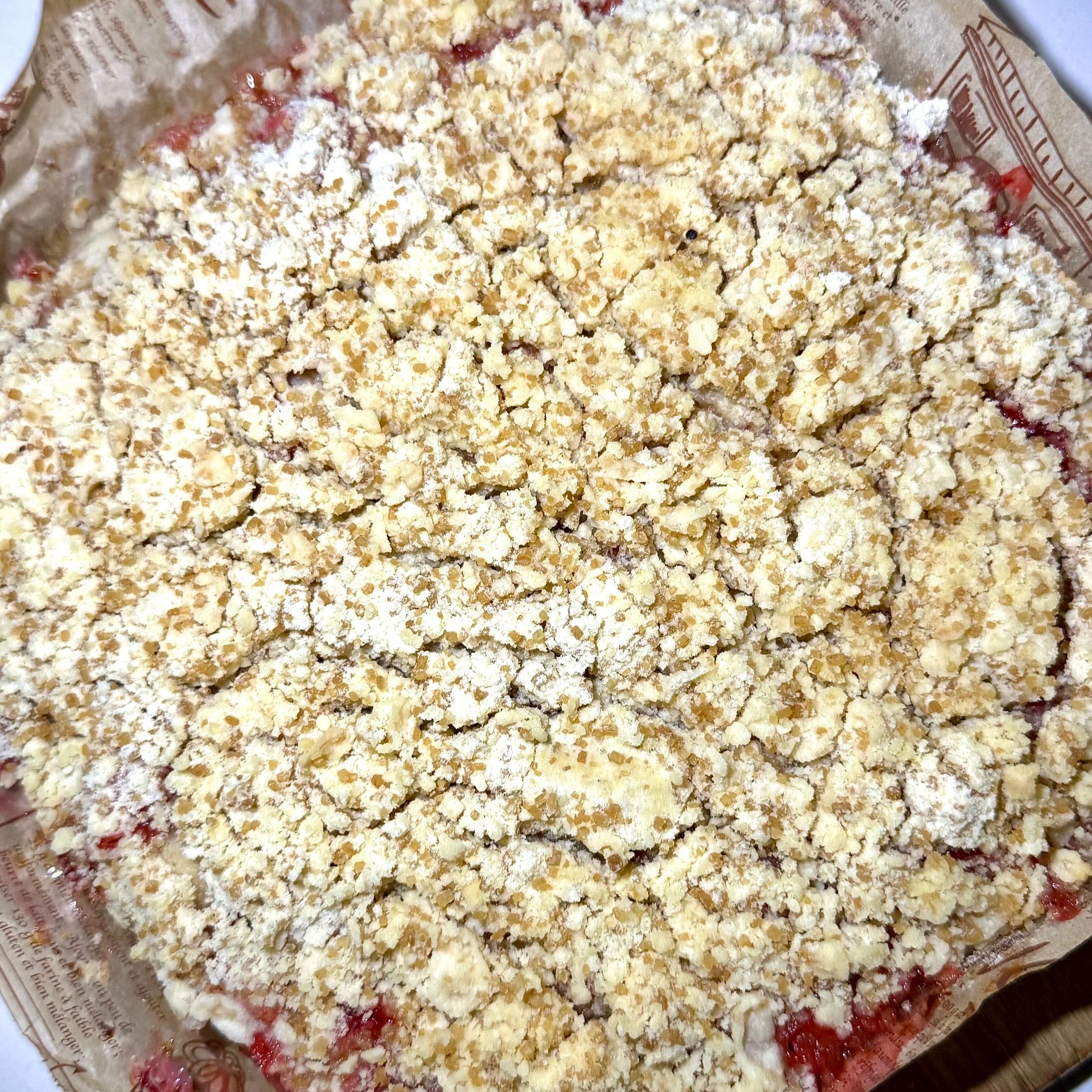  Bake until the crumble is golden and the strawberry layer is bubbling at the edges. 